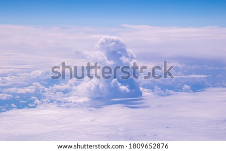 Cloud formations as weather heats up and cools across our lovely planet, Earth. Seen from high above, from an aircraft view.