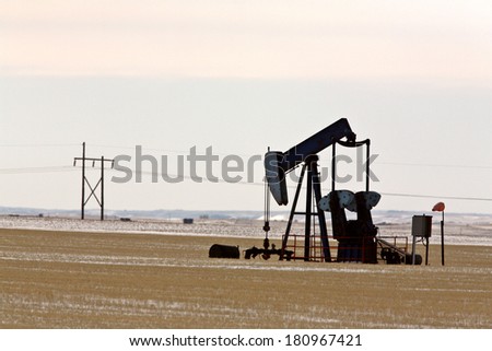 Oil pump jack in winter
