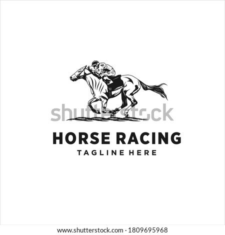 Horse racing. Jockey on racing horse running to the finish line. Race course Royalty-Free Stock Photo #1809695968