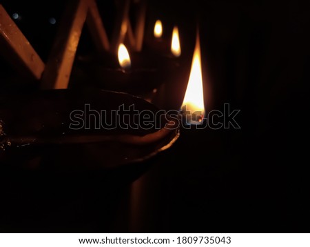 uttarakhand,India-2 june 2020:diya.oil lamp in dark.this is a picture of burning oil lamp in the festival of diwali.oil lamp wallpapers. 