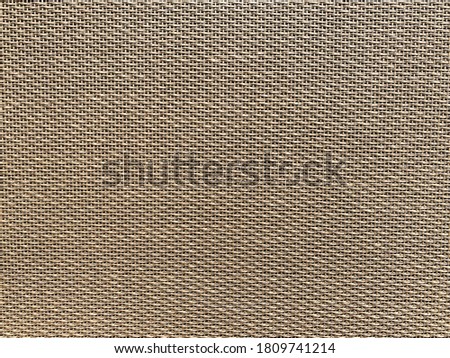 brown cream speaker grill look Like woven bamboo can use for background, backdrop and texture with copy space for letter. concept for instrumental. Royalty-Free Stock Photo #1809741214