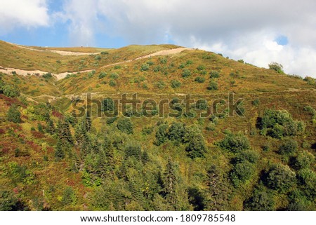 View of Rosa Peak mountain in autumn in the Rosa Khutor ski resort in Sochi, Krasnodar region, Russia.
