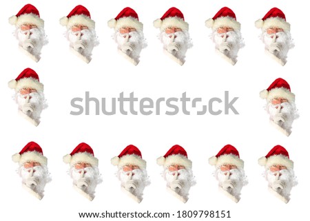 Secret Santa Picture Frame. Santa Claus holds his finger to his lips to say he has a Secret. Isolated on white. 