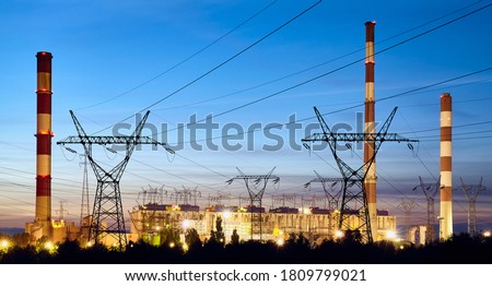 Picture of a coal power plant at dusk.