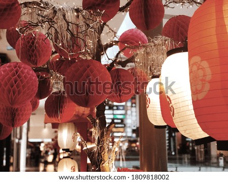 Red Chinese New Year lanterns on Chinatown. These typical paper lanterns are good luck symbols, which translates to Prosperity.