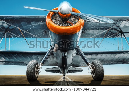 sports plane on a runway ready for take off Royalty-Free Stock Photo #1809844921
