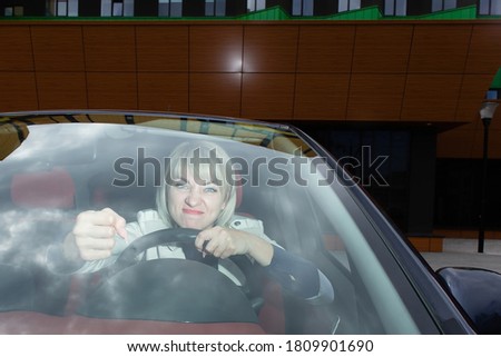the Emotional blonde behind the wheel,