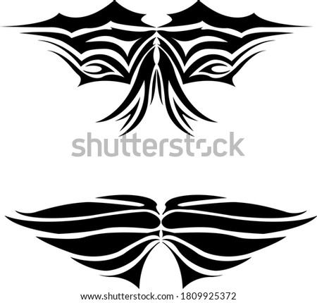 
set of black and white abstract patterns in the form of wings