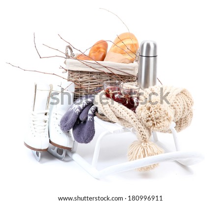 Winter still life on sled, isolated on white