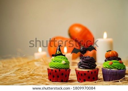 Cool Halloween decorated cupcakes, copy space 