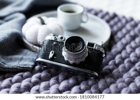 vintage camera and trendy autumn accessories and decor