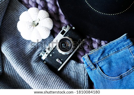 vintage camera and trendy autumn accessories and decor