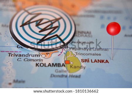 Pin marked sea Sri Lanka with logo earthquake
