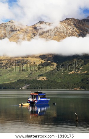 Boat and Mountains at beautiful nz lake