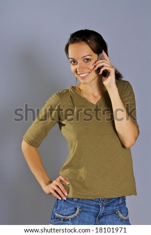 Beautiful girl talks on the telephone