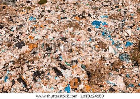 Aerial view of garbage dump landfill from drone pov, disposal of waste material
