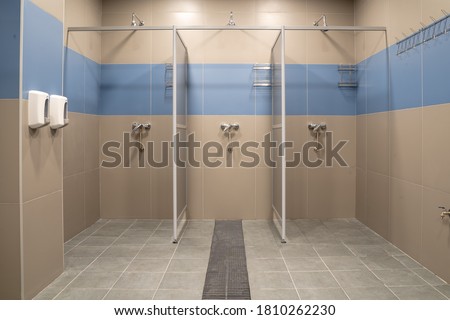 men's and women's locker rooms in a modern fitness center in russia Royalty-Free Stock Photo #1810262230