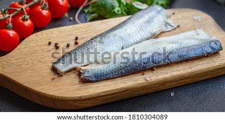 herring fish raw seafood serving size natural product top view place for text copy space keto or paleo diet pescetarian 