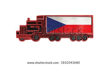Toy truck with Czech Republic flag shown isolated on white background. The concept of cargo transportation between countries.