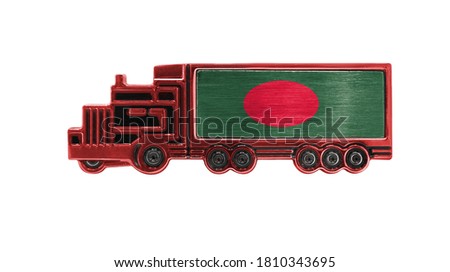 Toy truck with Bangladesh flag shown isolated on white background. The concept of cargo transportation between countries.