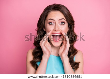 Close-up portrait of her she nice attractive lovely pretty gorgeous glad cheerful cheery wavy-haired girl sharing good news reaction isolated over pink pastel color background