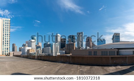 View of the Houston Skyline from Large Rooftop Parking Lot