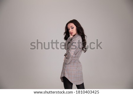 Beautiful girl student business woman on grey or white background