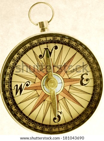 old compass on old paper 