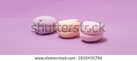 airy sweet vanilla marshmallow pastel color on pink purple background, banner