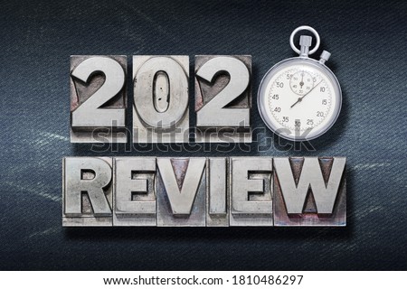 review 2020 phrase made from metallic letterpress with stopwatch Royalty-Free Stock Photo #1810486297