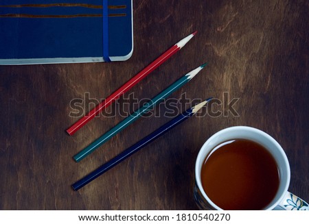 Multi-colored pencils on sketch book