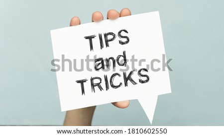Tips Tricks card with sky background, business concept