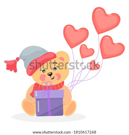 
Сute, cartoon, isolated teddy bear in a warm hat holds a gift and balloons. 
For postal greeting cards, flyers, labels. 
Vector illustration on white background.