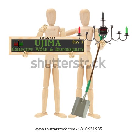 Kwanzaa Ujima (African for Collective Work and Responsibility) sign held by wood mannequin