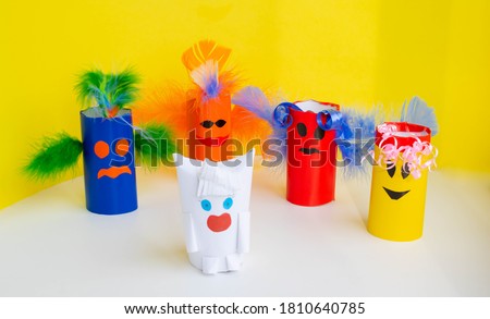 The concept of Halloween, carnival and New year .Jewelry-monsters from a roll of toilet paper. Simple crafts, creative idea, DIY. ECO-friendly re-use of coils