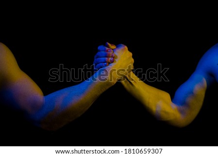 Helping hand concept and international day of peace, support. Helping hand outstretched, isolated arm, salvation. Close up help hand. Two hands, helping arm of a friend, teamwork