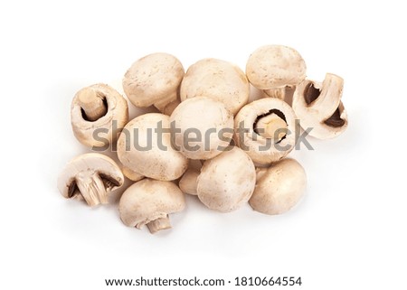 Fresh Champignon mushrooms, isolated on white background.
