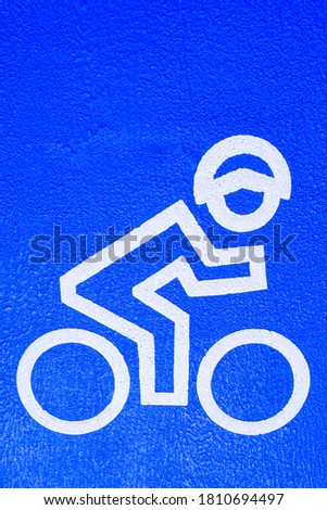 Bicycle riding blue with white 
