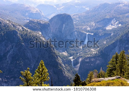 View of Vernal Fall and Nevada Falls, the Mist Trail, from Glacier Point in summer, Yosemite National Park, California 