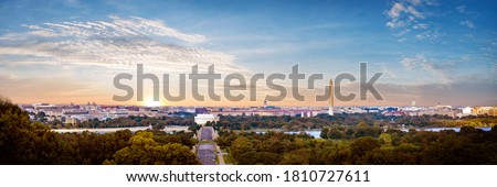 Panorama view of Washington DC skyline when sunset seen from Arlington cemetery, Washington DC, USA. Royalty-Free Stock Photo #1810727611