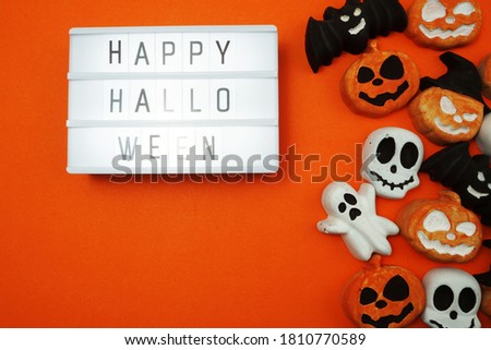 Top view Happy Halloween word in Light box flat lay