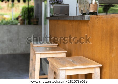 Old wood chair in coffee cafe shop, vintage style.