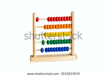 children toy rainbow wooden abacus isolated on white Royalty-Free Stock Photo #1810824019