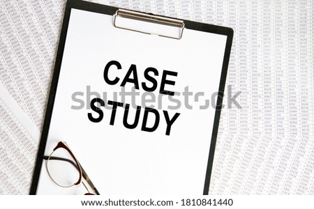 Notepad with text CASE STUDY on a white background, near calculator and office supplies. Business concept.