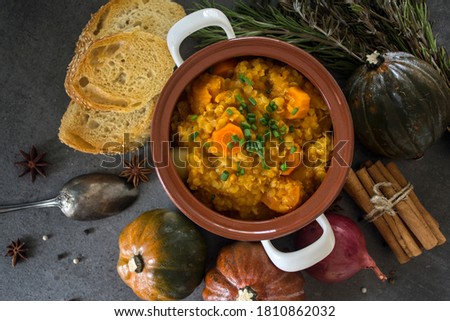 A healthy Moroccan stew with butternut squash, carrot, sweet potato and lentils. Healthy eating concept. 