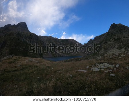 young man hiking a mountain in pyrenees