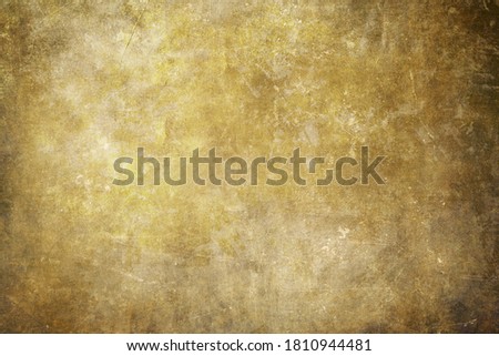Old scraped golden background or texture 