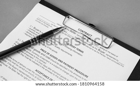 Pen on business contact. black and white image