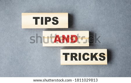Tips And Tricks Text Message On Wooden blocks