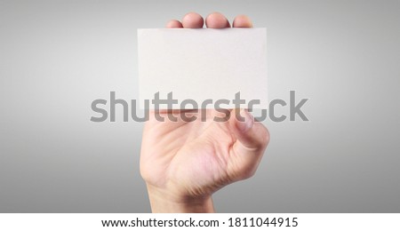 Hand holding a virtual card with your. Isolated